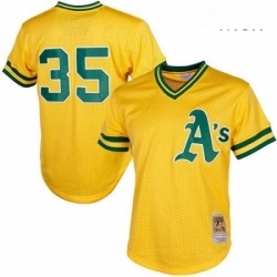 Mens Mitchell and Ness Oakland Athletics 35 Rickey Henderson Replica Gold 1984 Throwback MLB Jersey
